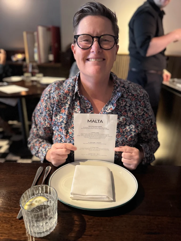 Maltese Feast dishes include fish, olives, dip, donuts at Maha East