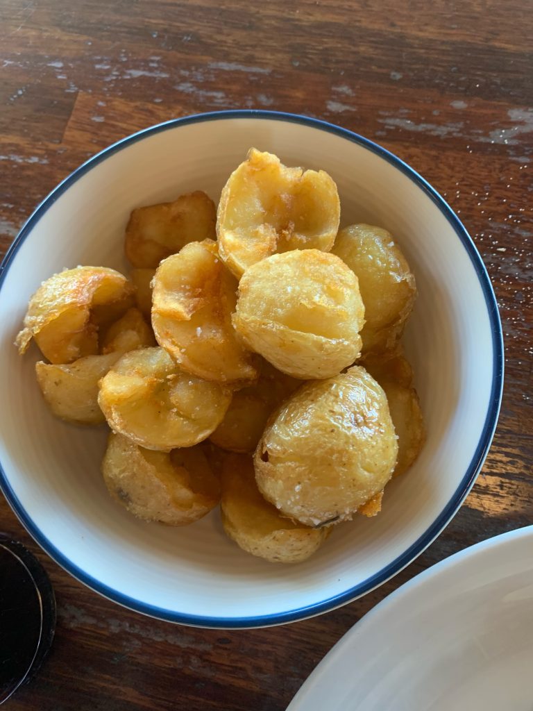 Potatoes fourno, Greek-style lemon roasted potatoes, is a must have at A La Grecque, Aireys Inlet