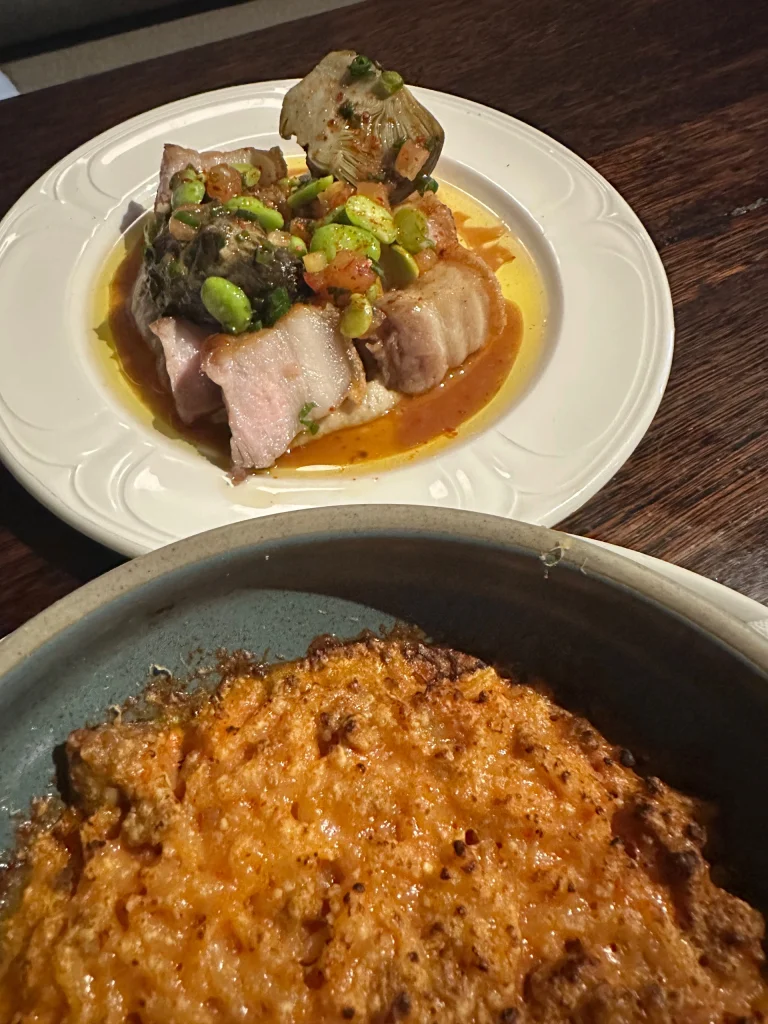 ross il forn - crispy bakes rice, with pork and beef spiced tomato ragu finished with parmeasan