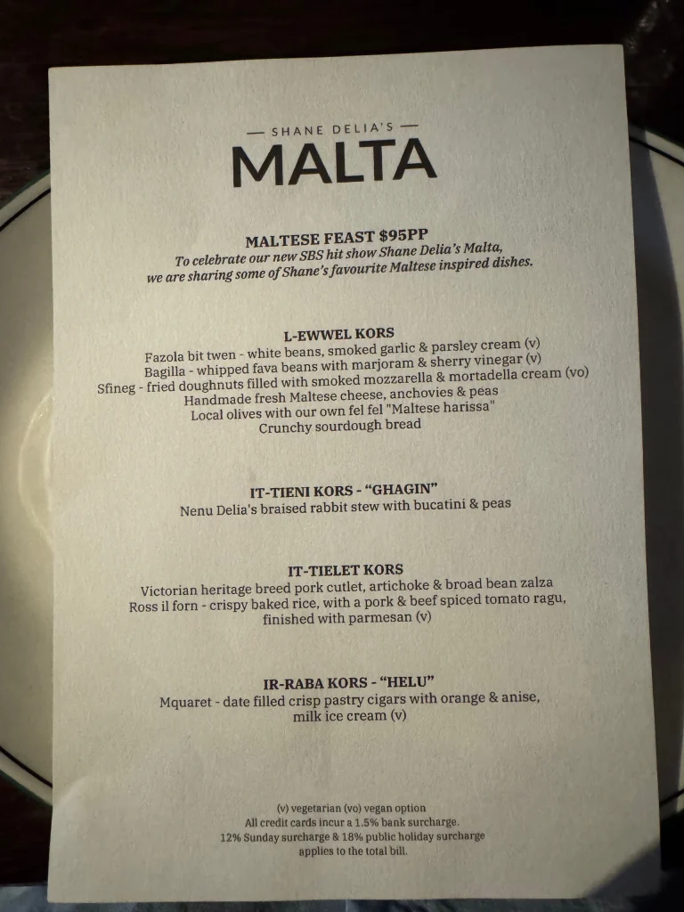 Maltese Feast dishes include fish, olives, dip, donuts at Maha East