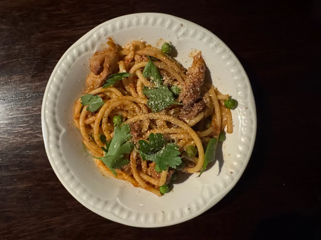 Nenu Delia's Braised Rabbit Stew with bucatini and peas